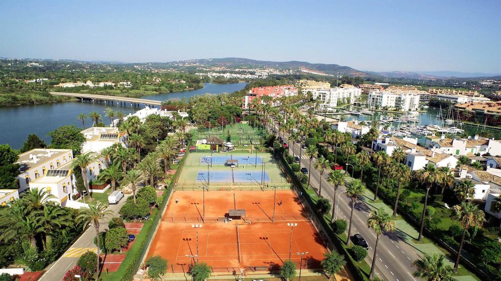The next image showcases tennis courts within the area, reflecting the recreational amenities and active lifestyle options available in Sotogrande Real Estate.