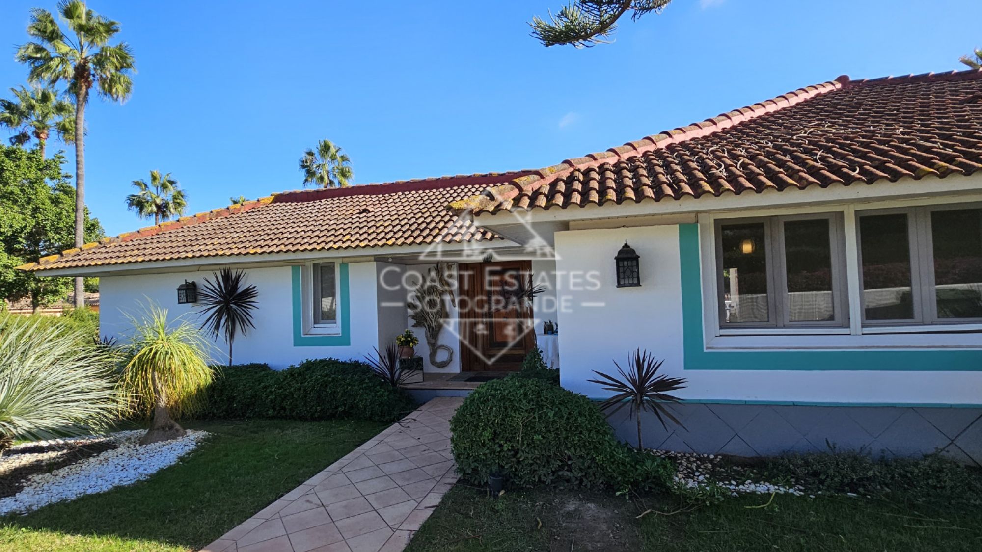 Espaciosa villa de verano con piscina y divertidas comodidades: perfecta para familias en Sotogrande Costa